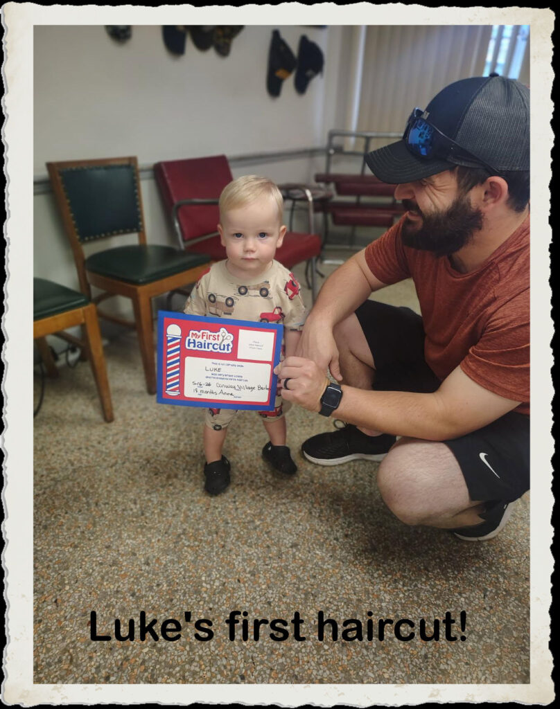 Luke's first haircut at Conway Village barber Shop!