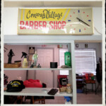 Conway Village Barber Shop wall clock and figurines