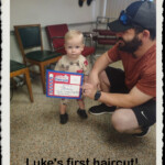 Luke's first haircut at Conway Village barber Shop!